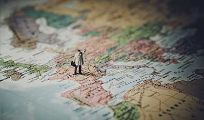 figurine on a map