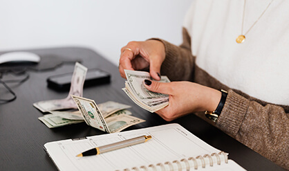 woman counting cash