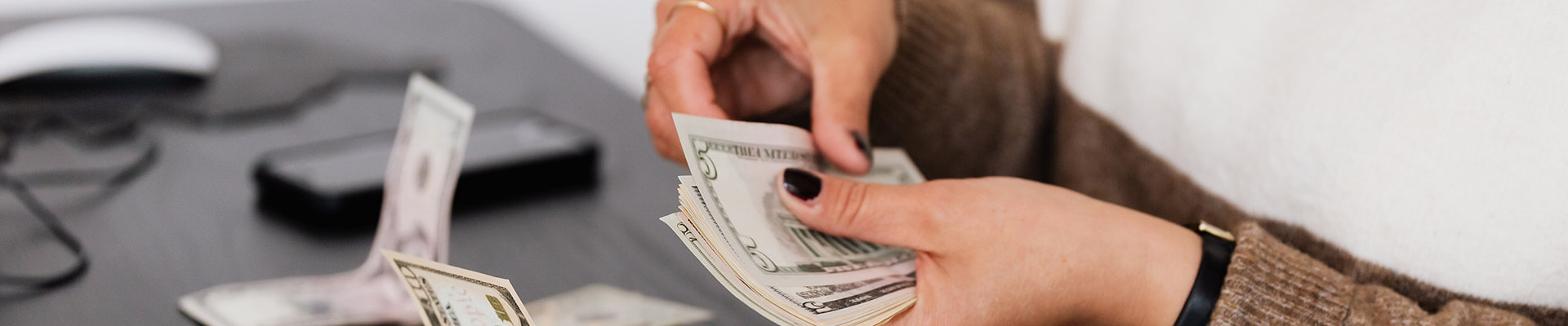 woman counting cash